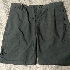 Greg Norman Shorts. Mens Size 38. Black/Grey in color. Worn very lightly